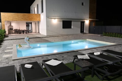 Patio, Night, Pool view, Swimming pool, Swimming pool, sunbed