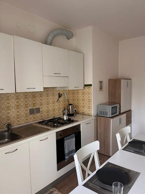 Kitchen or kitchenette, Dining area, oven, stove, toaster