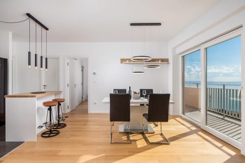 View (from property/room), Balcony/Terrace, Seating area, Dining area, Sea view