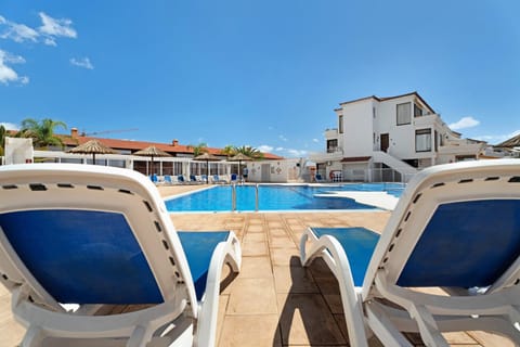 Property building, Living room, Swimming pool