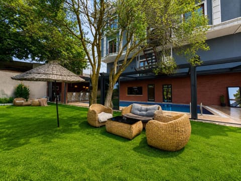 Property building, Patio, Spring, Day, Garden, Garden view, Pool view, Swimming pool