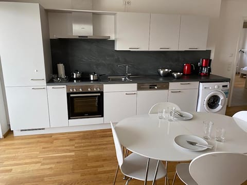 Kitchen or kitchenette, Dining area, dishwasher, oven, stove, washing machine