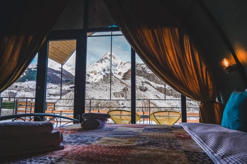 Bed, Natural landscape, Winter, View (from property/room), View (from property/room), Living room, Seating area, Bedroom, Mountain view