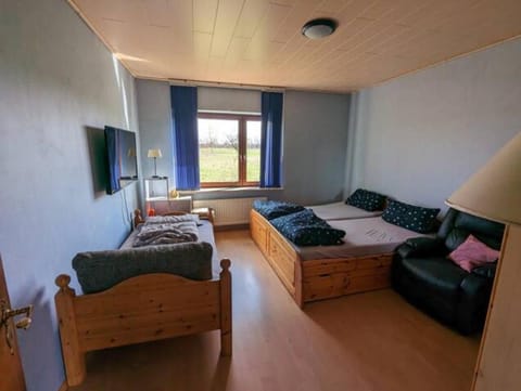 Communal lounge/ TV room, Bedroom