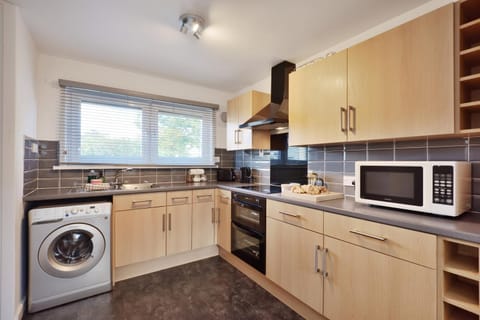 microwave, oven, toaster, washing machine, kitchen