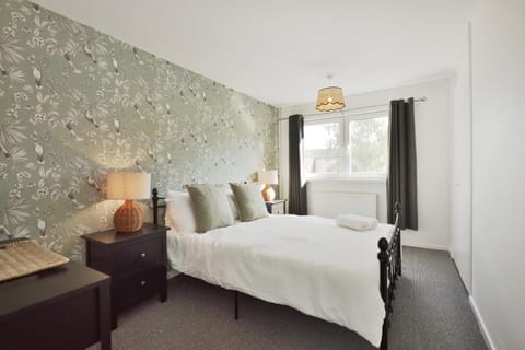 Bed, Bedroom, hair dryier, towels, wardrobe