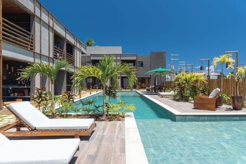 Property building, Day, Pool view, Swimming pool, sunbed