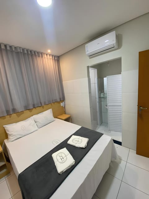 Bed, Photo of the whole room, Bedroom, towels, air conditioner