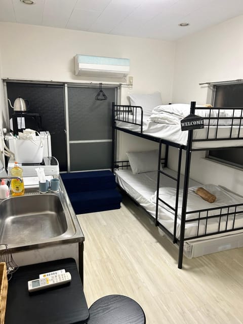 Bathroom, Photo of the whole room, Bedroom, bunk bed, towels, air conditioner