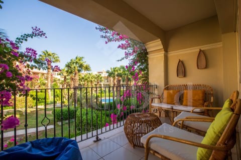 Patio, Balcony/Terrace, Seating area, Garden view, Pool view