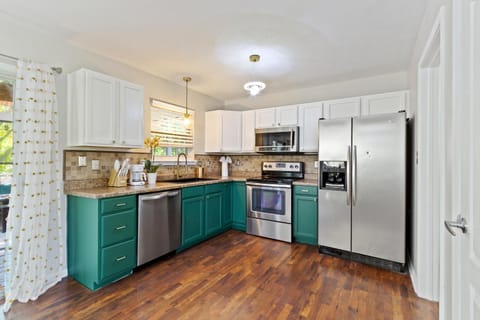 Kitchen or kitchenette, dishwasher, oven, stove, toaster