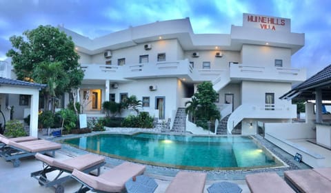 Property building, Swimming pool, Sunset