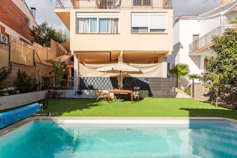Property building, Living room, Swimming pool