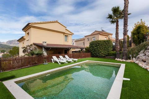 Property building, Living room, Swimming pool