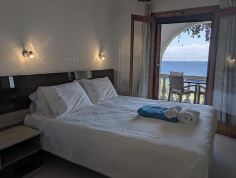 Bed, Sea view, towels