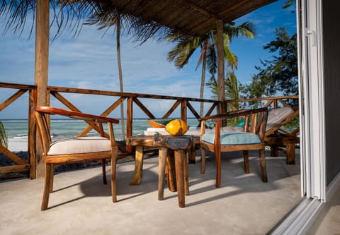 Patio, Natural landscape, View (from property/room), Balcony/Terrace, Living room, Seating area, Dining area, Beach, Sea view