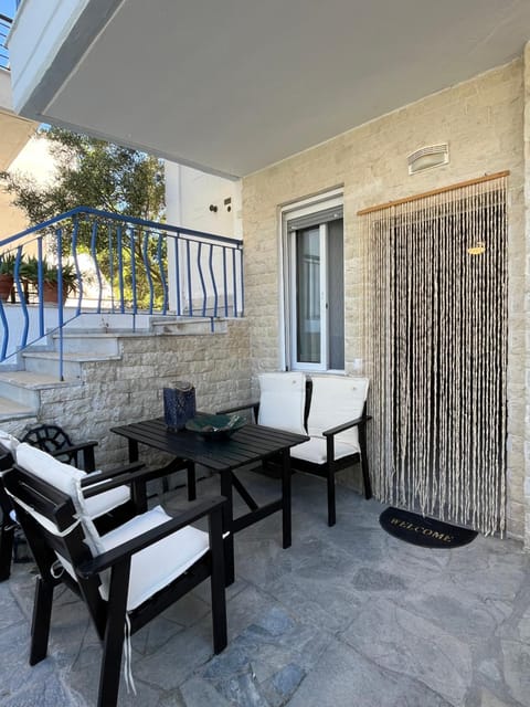 Property building, Patio, Day, View (from property/room), Balcony/Terrace, Living room, Seating area