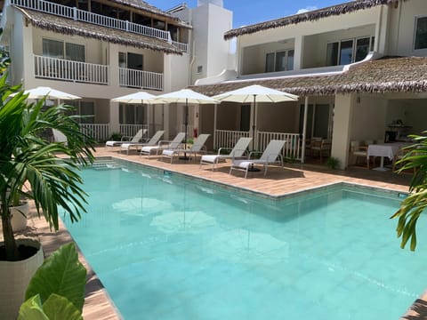 Property building, Pool view, Swimming pool, sunbed