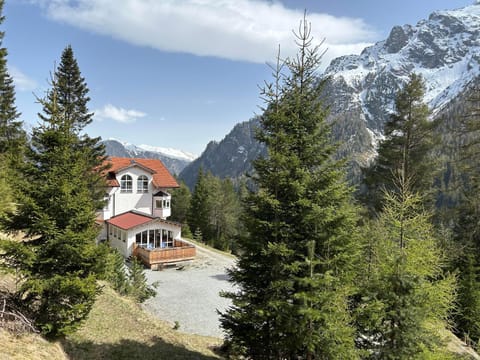 Property building, Spring, Day, Natural landscape, Mountain view