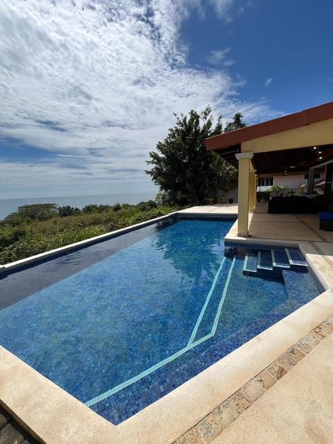 Patio, Day, Pool view, Sea view