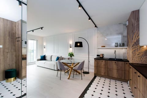 Kitchen or kitchenette, Living room, Seating area, Dining area