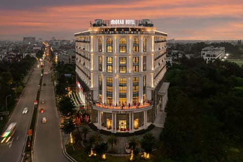 Property building, Facade/entrance, Night, Property logo or sign, Bird's eye view, Sunset