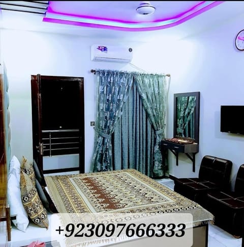 Bed, TV and multimedia, Seating area, Bedroom, air conditioner