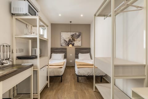 Studio 44 with twin beds & kitchenette at the new Olo living Bed and Breakfast in Saint Julians