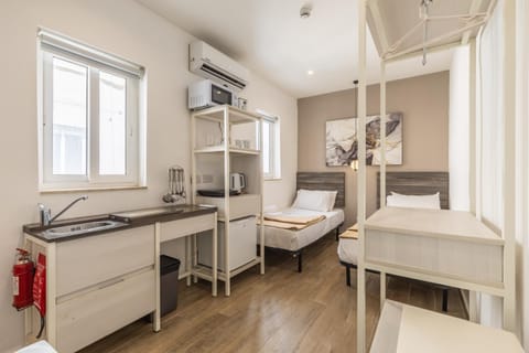 Studio 44 with twin beds & kitchenette at the new Olo living Bed and Breakfast in Saint Julians