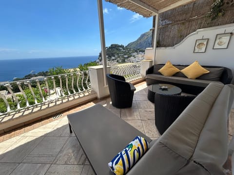 Day, Natural landscape, View (from property/room), Balcony/Terrace, Living room, Seating area, Mountain view, Sea view