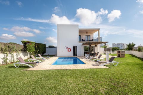 Property building, Living room, Swimming pool