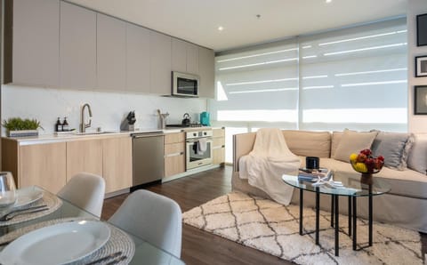 Kitchen or kitchenette, Living room, Seating area, Dining area