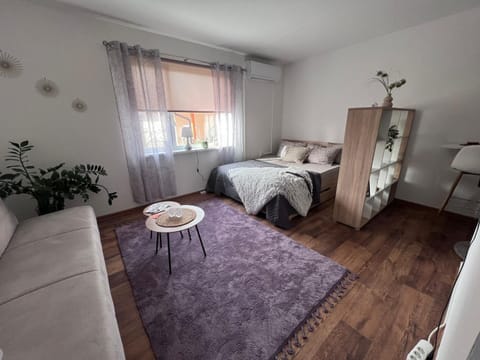 Bed, Living room, Seating area, Bedroom