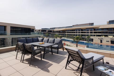 Property building, Patio, Day, Balcony/Terrace, Seating area, Pool view, Swimming pool, sunbed