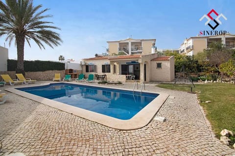 Property building, Patio, Pool view, Swimming pool
