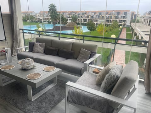 Balcony/Terrace, Living room, Pool view