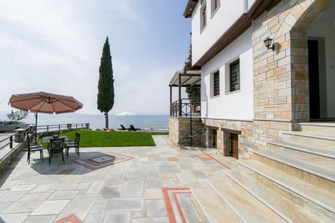 Property building, Day, Natural landscape, View (from property/room), Dining area, Sea view