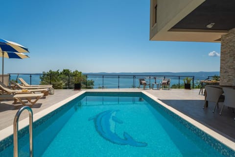 Patio, Natural landscape, Sea view, Swimming pool