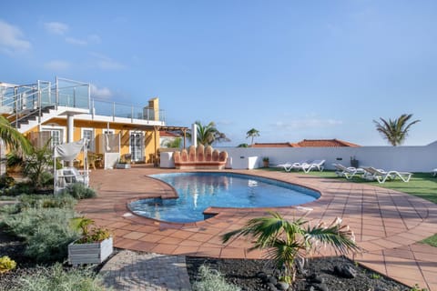 Property building, Living room, Swimming pool