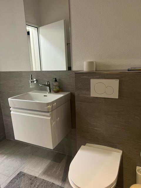 Basel-Stadt Gundeldingen Zimmer 402, WC in the hallway, outside the room Hostel in Basel