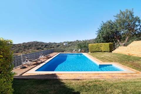 Property building, Living room, Swimming pool