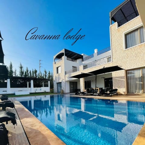 Property building, Patio, Day, Balcony/Terrace, Text overlay, Pool view, Swimming pool, sunbed