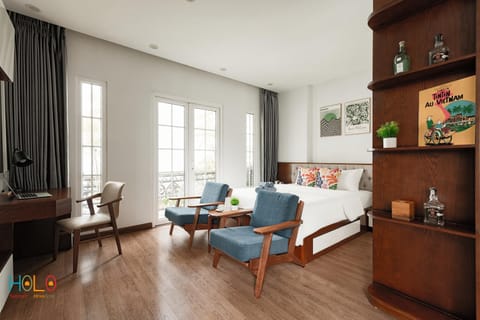 Bed, Living room, Seating area, Bedroom