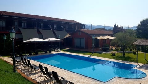 Property building, Facade/entrance, Garden, Garden view, Pool view, Swimming pool, sunbed