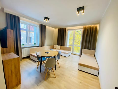 Bed, TV and multimedia, Living room, Seating area, Dining area, locker, air conditioner