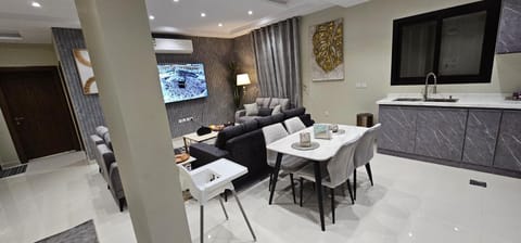 TV and multimedia, Kitchen or kitchenette, Living room, Seating area, Dining area, air conditioner