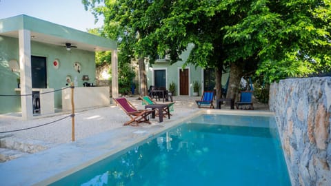 Property building, Patio, Day, Communal kitchen, Pool view, Swimming pool, sunbed