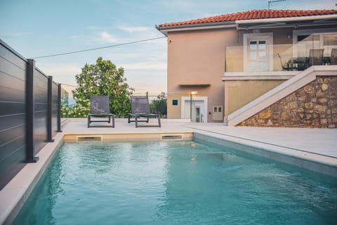 Property building, Day, View (from property/room), Swimming pool