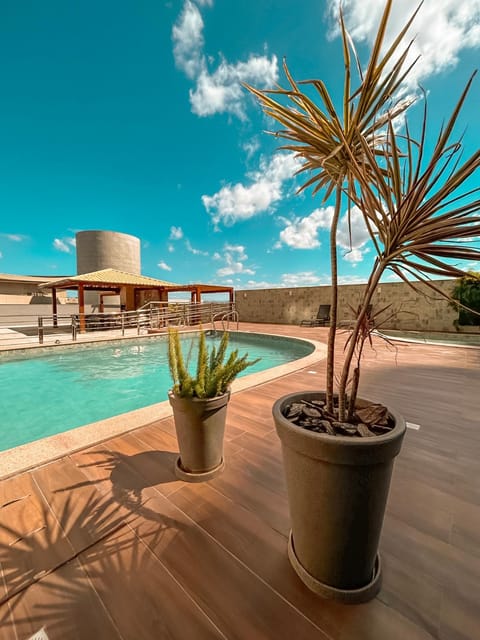 Property building, Patio, Day, Natural landscape, Swimming pool, Swimming pool, sunbed