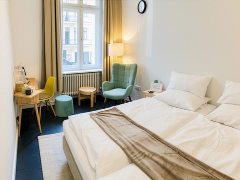 Bed, Seating area, Bedroom